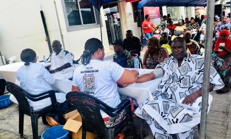 • Nii Tetteh Adjabeng II (right) having his vitals checked at the event Photo: Stephanie Birikorang