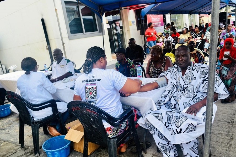 • Nii Tetteh Adjabeng II (right) having his vitals checked at the event Photo: Stephanie Birikorang