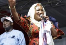 • Mrs Samira Bawumia (inset) addressing the residents at the rally ground