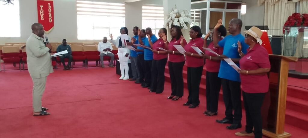 • Mr Doku swearing in the executives of the associationenforce