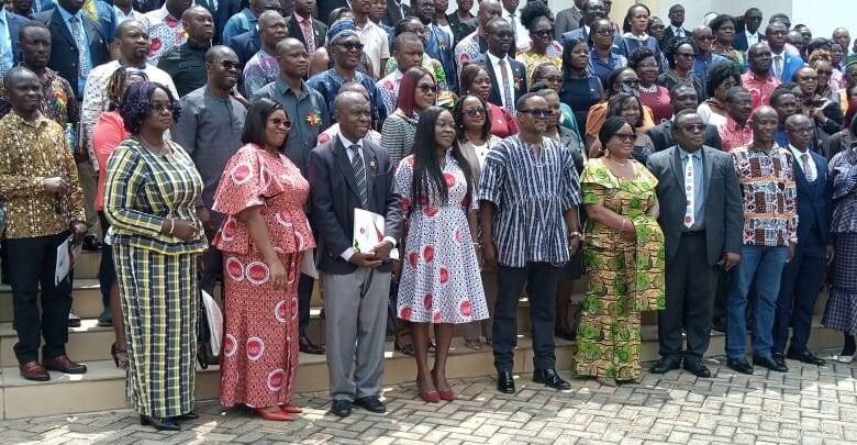 Prof. Gyan (seventh from left, front row), Dr Abbey (sixth from left, front row) and new members and graduands