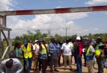 • (inset) Mr Asenso-Boakye (in white shirt) and others on the rehabilitated bridge