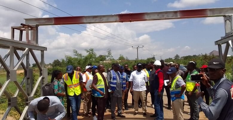 • (inset) Mr Asenso-Boakye (in white shirt) and others on the rehabilitated bridge