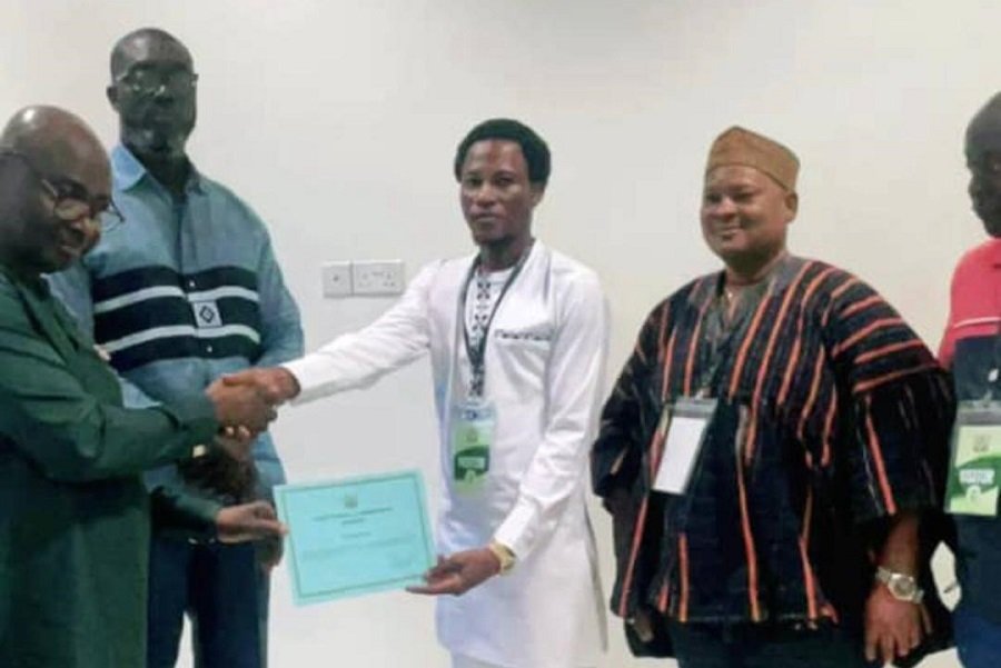 Flashback; Mr Namuru Tahiru of Action Alliance Party receiving certificate from Mr Benjamin Bano-Bioh, Director of Electoral Services of the EC