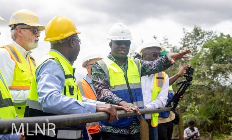 Inset: Mr Jinapor interacting with officials of the company