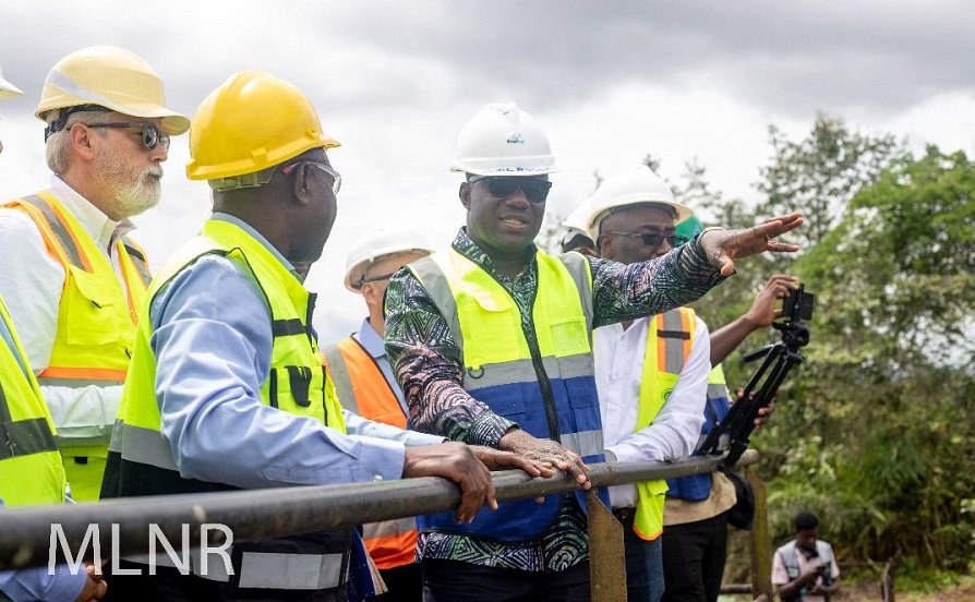 Inset: Mr Jinapor interacting with officials of the company