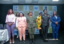 Madam Asabea Darko (left), Madam Oware Mensah and trophy ambassadors with the new league trophy