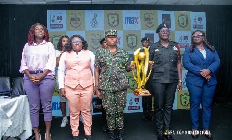 Madam Asabea Darko (left), Madam Oware Mensah and trophy ambassadors with the new league trophy