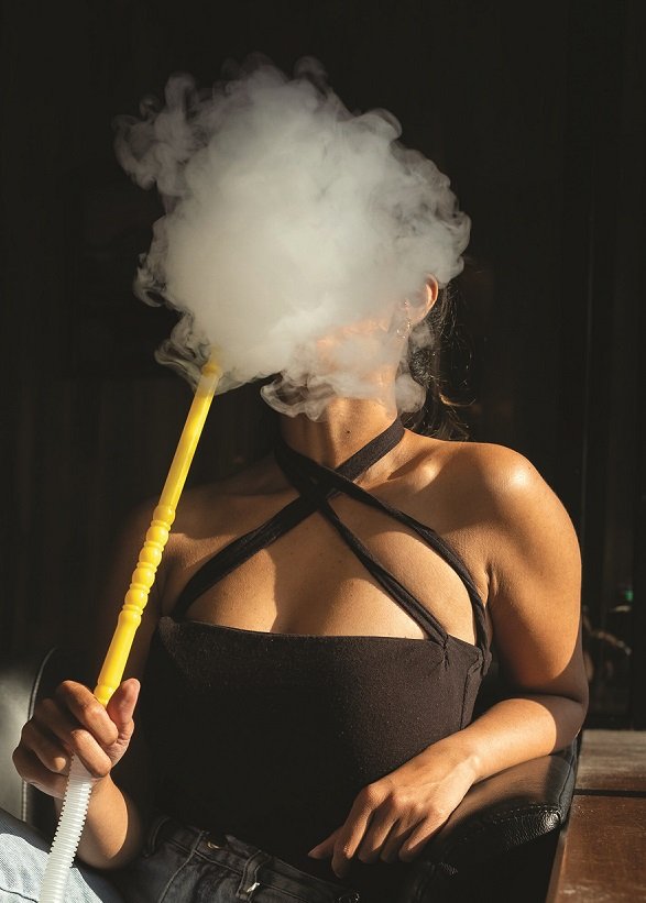 • A woman smoking shisha