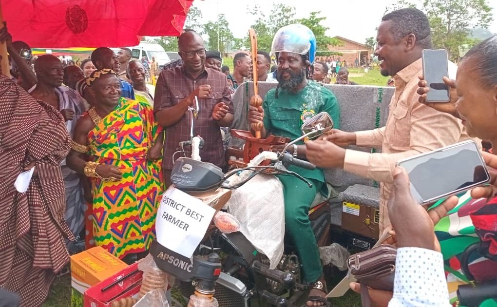 • Mr Appiah sitting on the tricycle and holding the sword,flanking him on his (left) is Mr Kusi and Mr Asiamah (right),and Chief of Adokwai