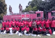 • ACFO II Rev. Naomi Ofori Adubea (middle) with the fire volunteers