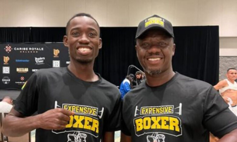 • Carl Lokko (right) and boxer John Laryea