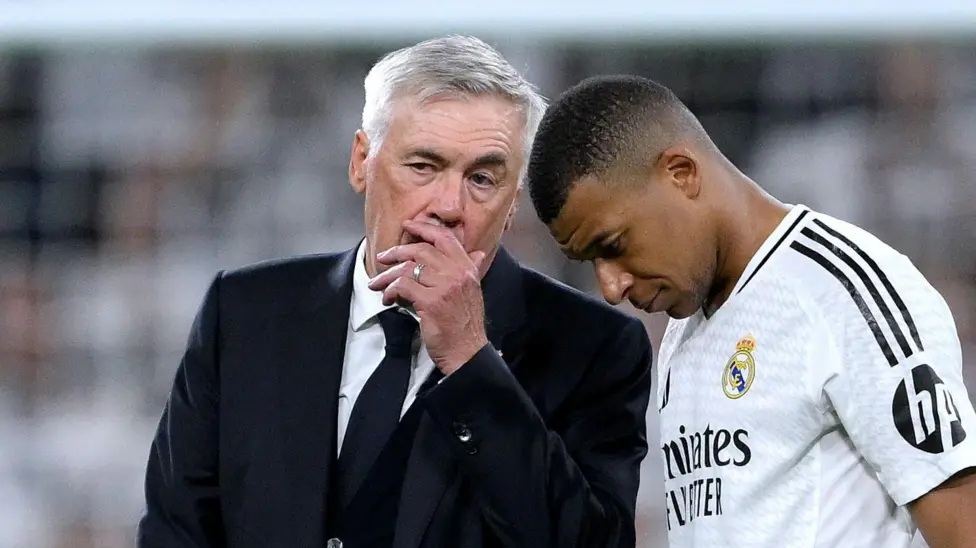 Carlo Ancelotti (left) with Kylian Mbappe