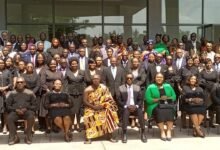 Chief Justice Torkonoo (fourth from left) with participants after the forum