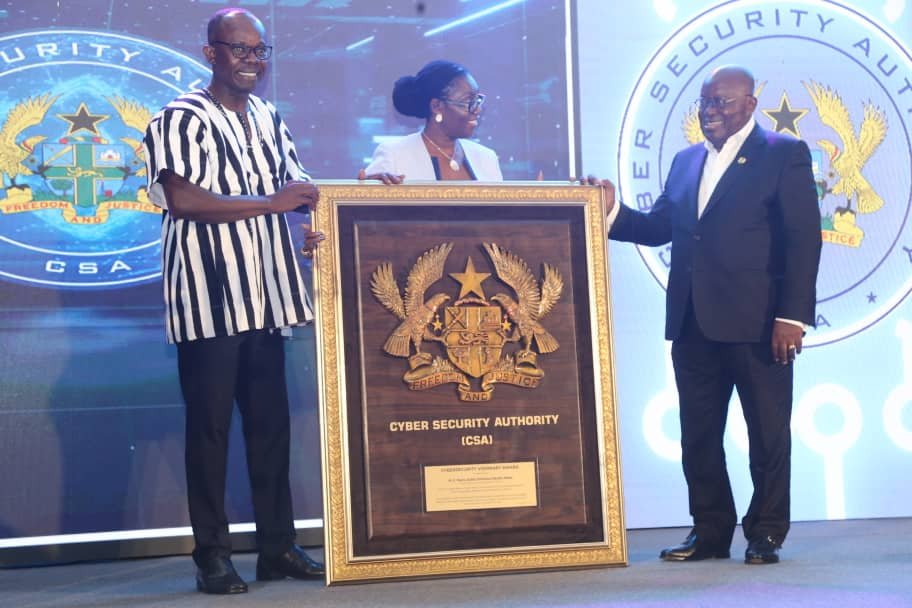 • President Akufo-Addo (right) receiving his award at the programme