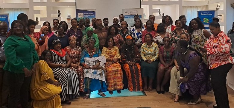 • Dr Binka (seated middle) with other stakeholders after the meeting