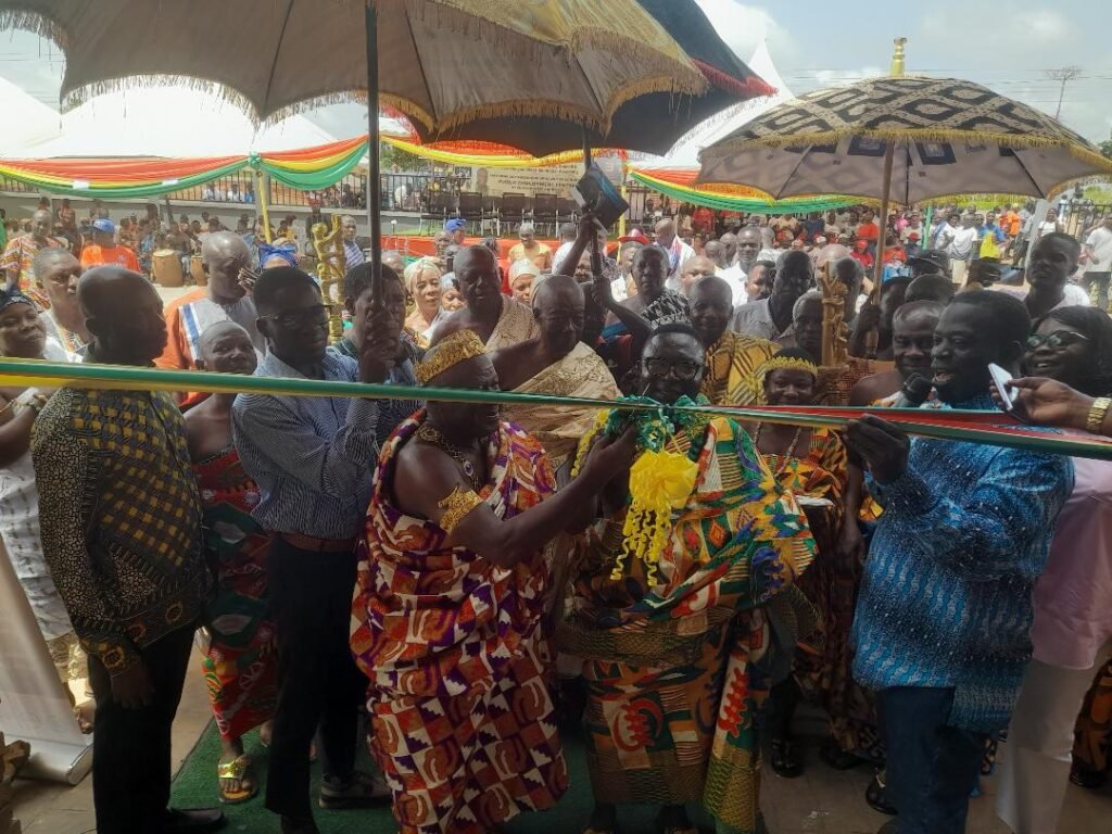 • Mr Ignatius BaffourAwuah (right) and some chiefs cutting the tape to open the facility