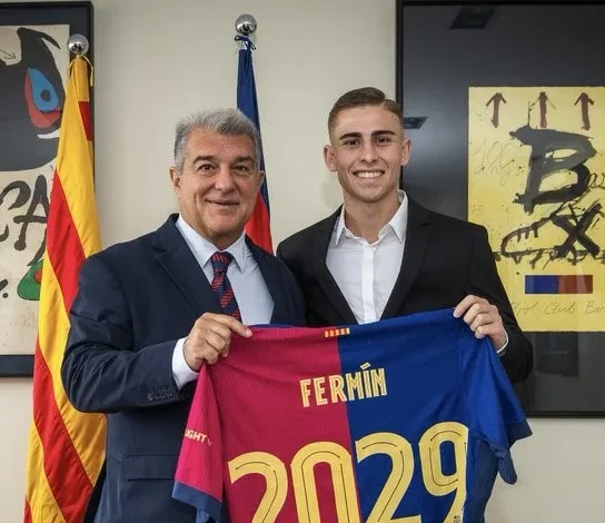 • Fermin Lopez (right) with club president Joan Laporta