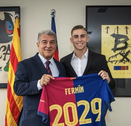 • Fermin Lopez (right) with club president Joan Laporta