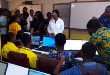 • Mrs Ursula Owusu-Ekuful (middle) interacting with some of the students