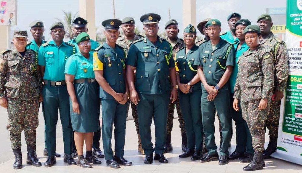 • Mr Doudu (middle) and Mr Normeshie (fourth from left) and other Immigration officers