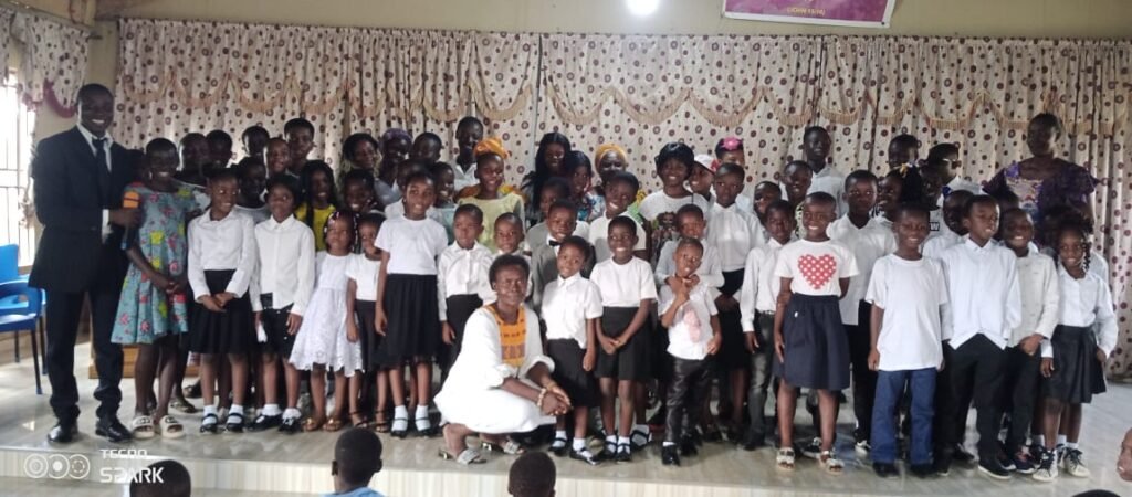 • The children with their teachers after the programme