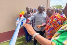 • Inset: Mr Martin Adjei-Mensah Korsah (middle) cutting a tape to inaugurate the facility