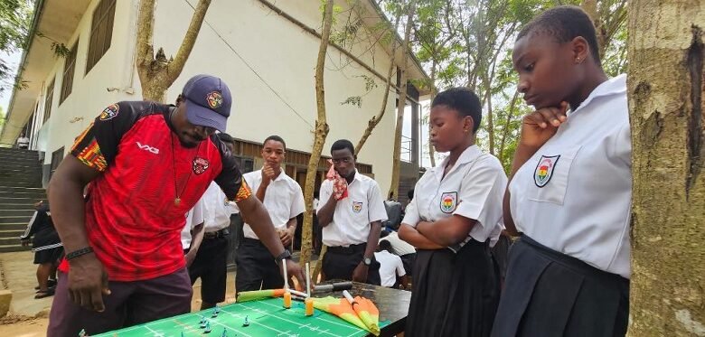 • Marshall Nortey, Head of Technical, Rugby League, demonstrates to school children some techniques of the game