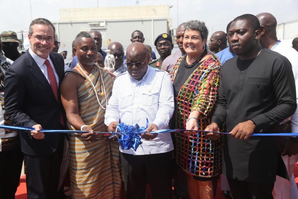 President Akufo-Addo (middle), being assisted by Herbert Krapa (right) Virgenia Palmer (second from right), US Ambassador to Ghana, Brain Herlihy (extreme left), Chief Executive Off