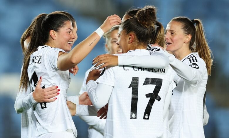 • Real Madrid players celebrating one of their goals