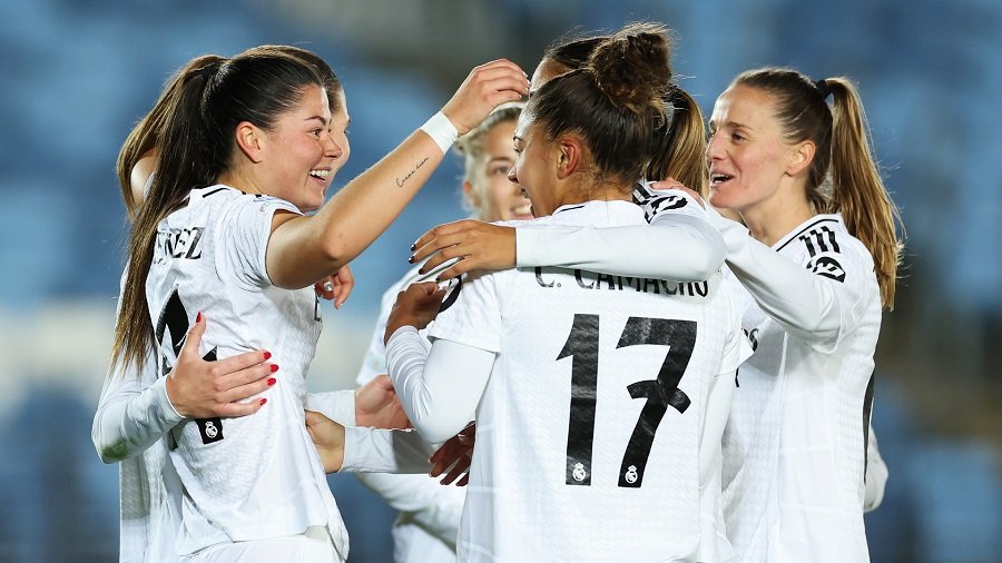 • Real Madrid players celebrating one of their goals