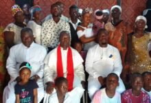 • Rev. Koranteng (middle) with some of the church members