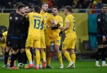 • Romania and Kosovo players having a go at each other during last Friday's game