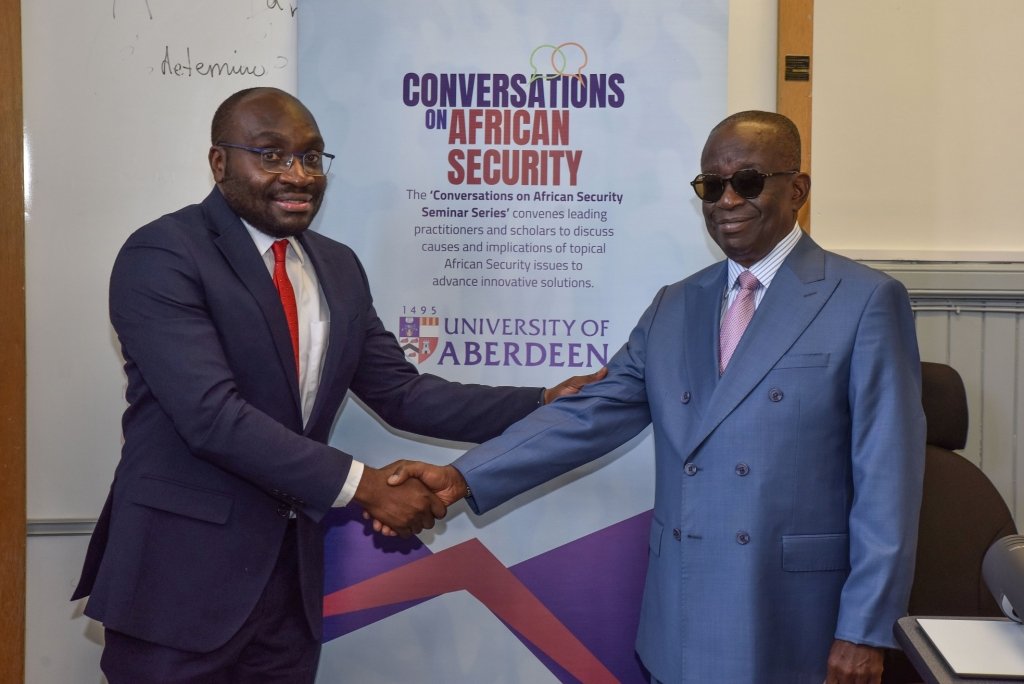 Dr Lekunze (left) in a handshake with Mr Kan-Dapaah (right)