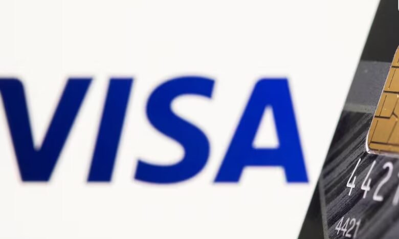 [1/2]Credit card is seen in front of displayed Visa logo in this illustration taken, July 15, 2021. REUTERS/Dado Ruvic/Illustration/File Photo Purchase Licensing Rights