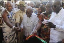 President Akufo-Addo (third from right), being supported by Nii Kweitei Titus Glover (right) , Nii Afotey Agbo (second from right), Chief of Katamanso, Francis Asenso Boakye (second from left) and Gbetsoolo Ashitey Ako