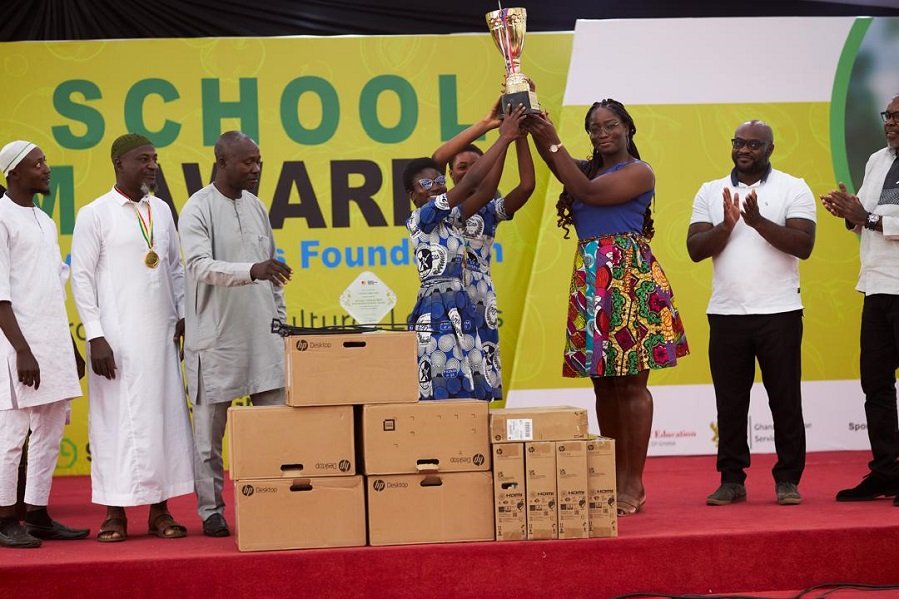 • Students of Tamale Girls SHS being presented with their trophy