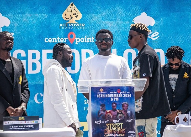 • Takyi (right) in a face-off with Quartey ahead of the bout