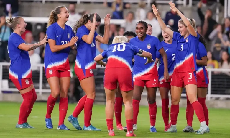 • USA players celebrating one of their goals