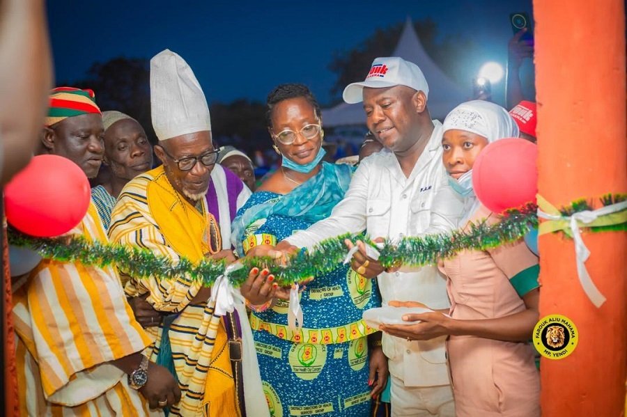 • Alhaji Farouk Aliu Mahama (second from right) being assisted by the Chiefs and dignitaries to open the facility