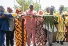 • (Dr. Hafiz Bin Salih, joined by the elders of Sumbrungu-Agusi community and health practitioners to cut the tape to open the facility