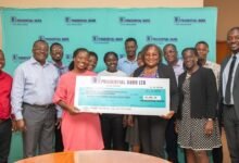 • Ms Disu (third from left) handing over the cheque to officials of the Oncology and Nuclear Medicine Centre