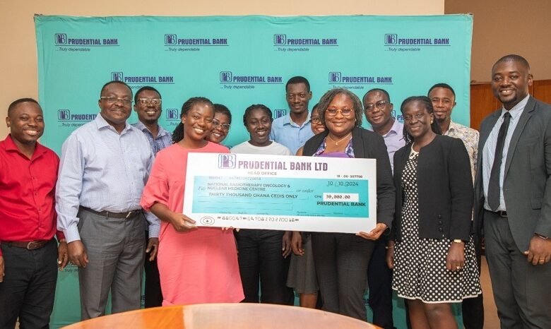 • Ms Disu (third from left) handing over the cheque to officials of the Oncology and Nuclear Medicine Centre