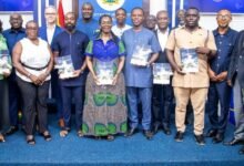 • Mrs Ursula Owusu-Ekuful (middle) with other dignitaries launching the policy documents