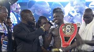 • Holy Dorgbetor with his title after the victory