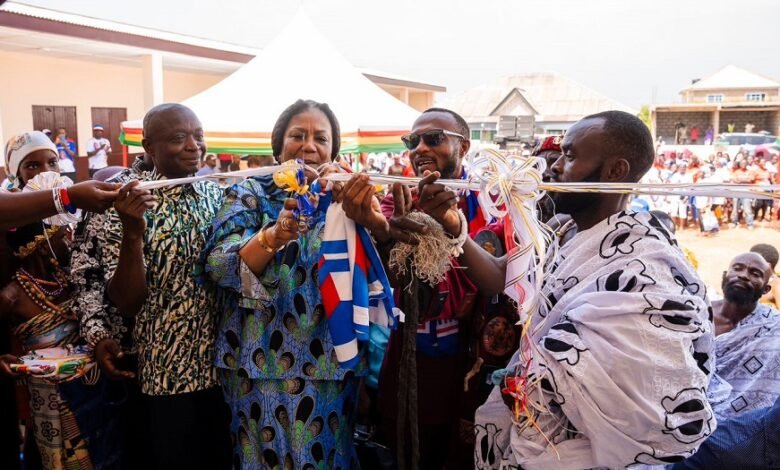 • Mrs Rebecca Akufo-Addo (middle) cutting tape to officially hand over the school block