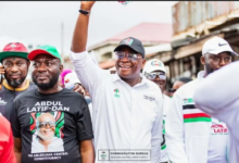 • Mr Abdul-Latif Dan (middle) and some NDC supporters