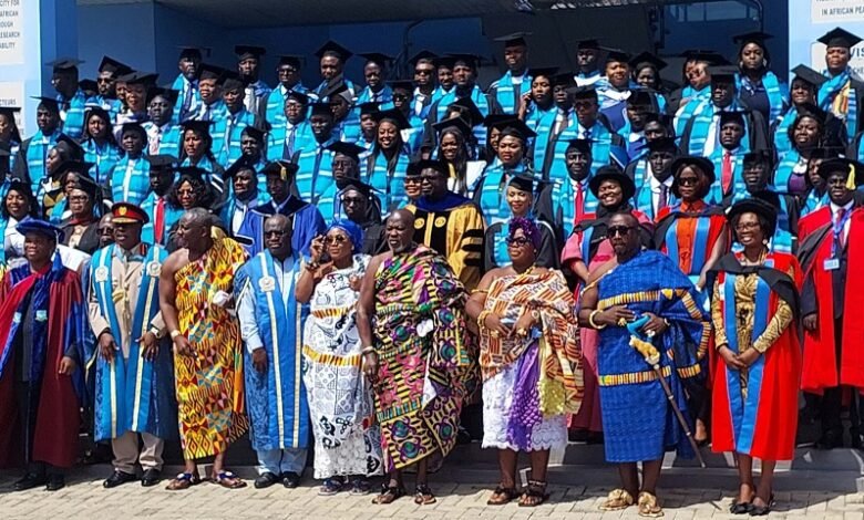 The graduands with dignitaries after the event