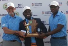 • Lucky Ayisah flanked by Hans De Beer (left) and Mr Alex Oppong Baffoe