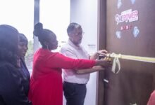 • Obaatanpa Nursing Facility. Inset: Mr Jean-Michel Arlandis cutting the ribbon to open the facility